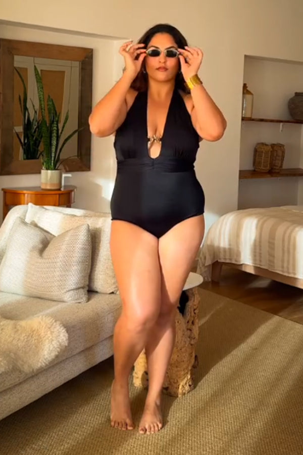 Sakshi Sindhwani in Black swan swimsuit